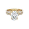 Anita Oval Cut Moissanite engagement ring with natural diamond halo and pavé band in 18KT gold