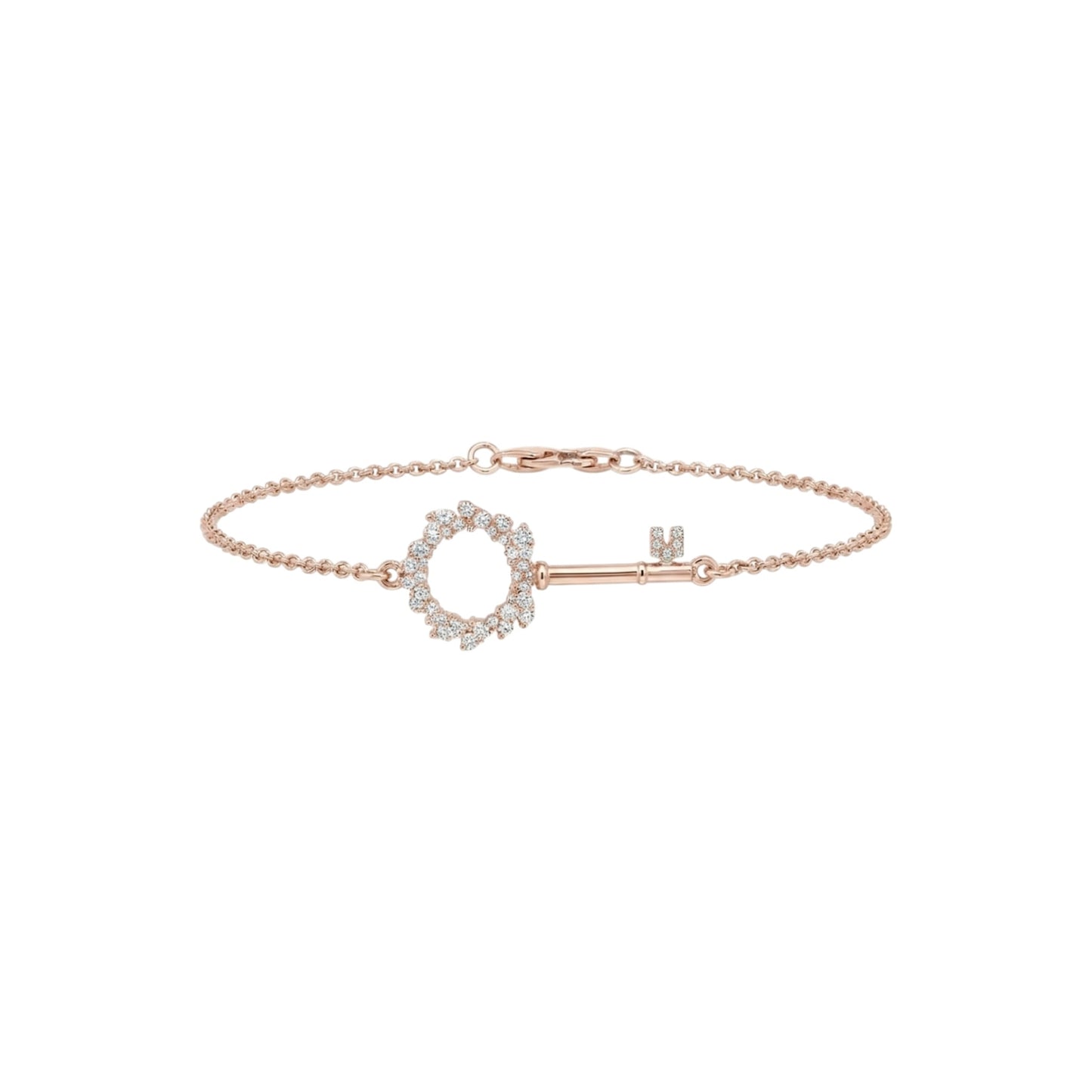 Rose gold bracelet with a key-shaped clasp on a white background