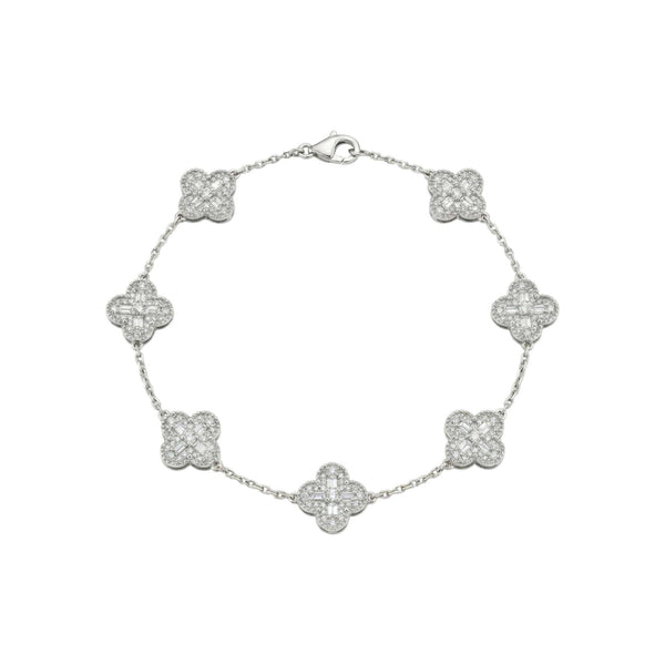 Silver bracelet with clover-shaped charms on a white background
