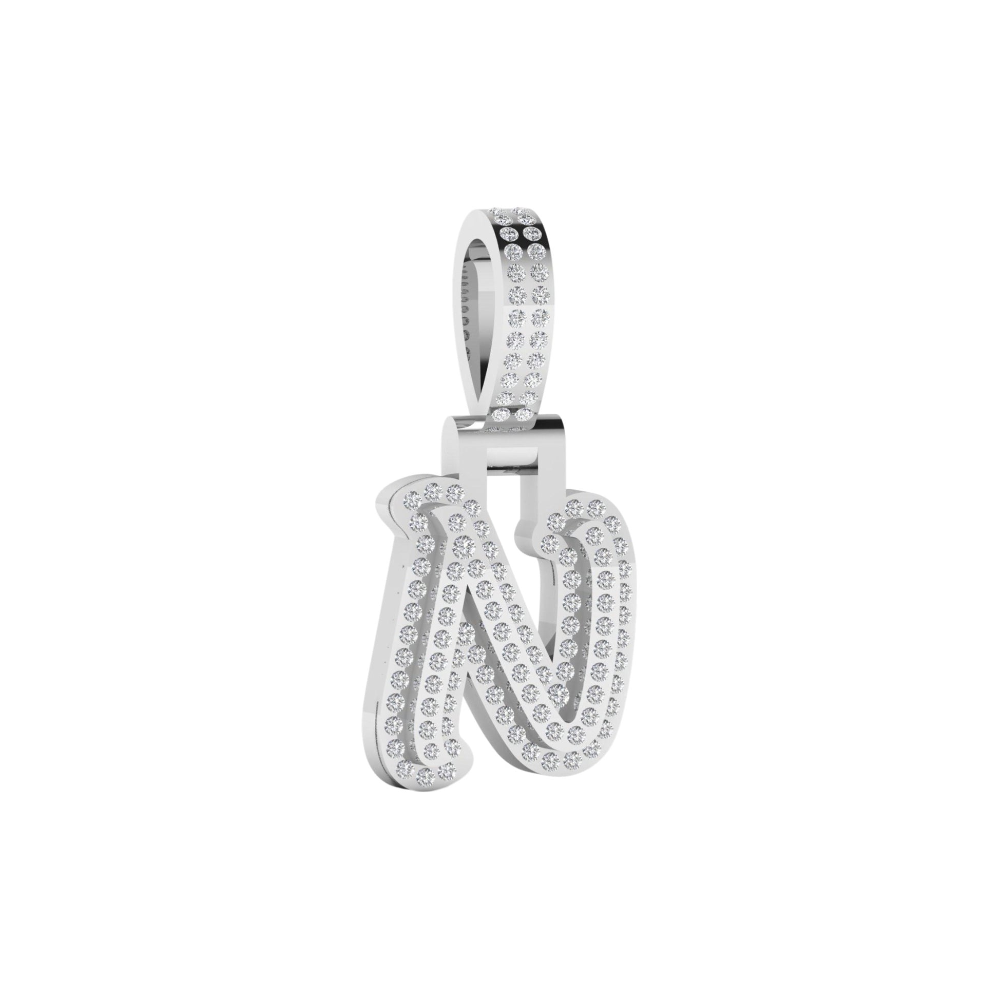 Silver pendant with 'N' and small stones on a white background
