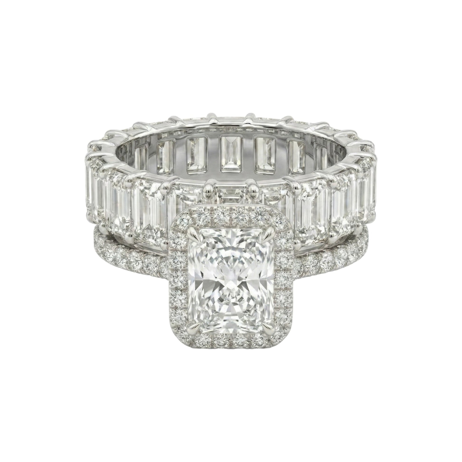 Diamond ring with a square-cut center stone and baguette side stones on a white background