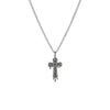 Silver cross necklace with black stones on a white background