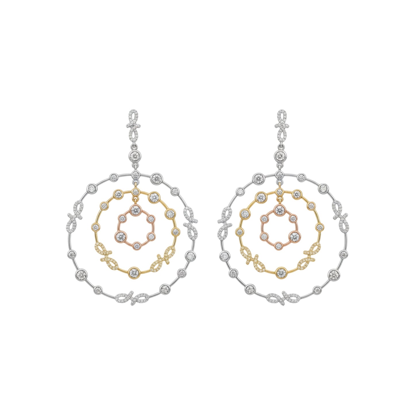 Pair of hoop earrings with gold and silver spiral design on a white background