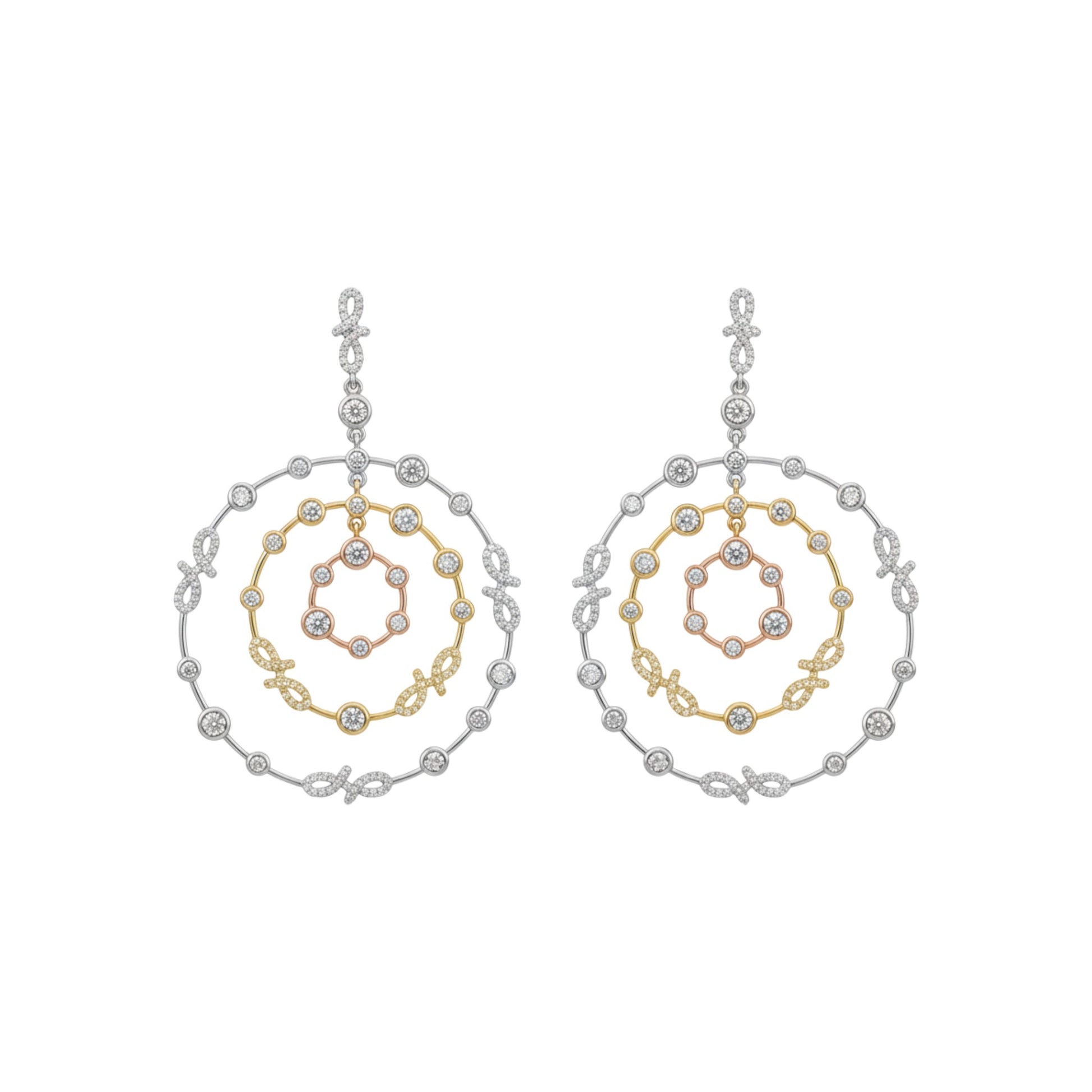 Pair of hoop earrings with gold and silver spiral design on a white background