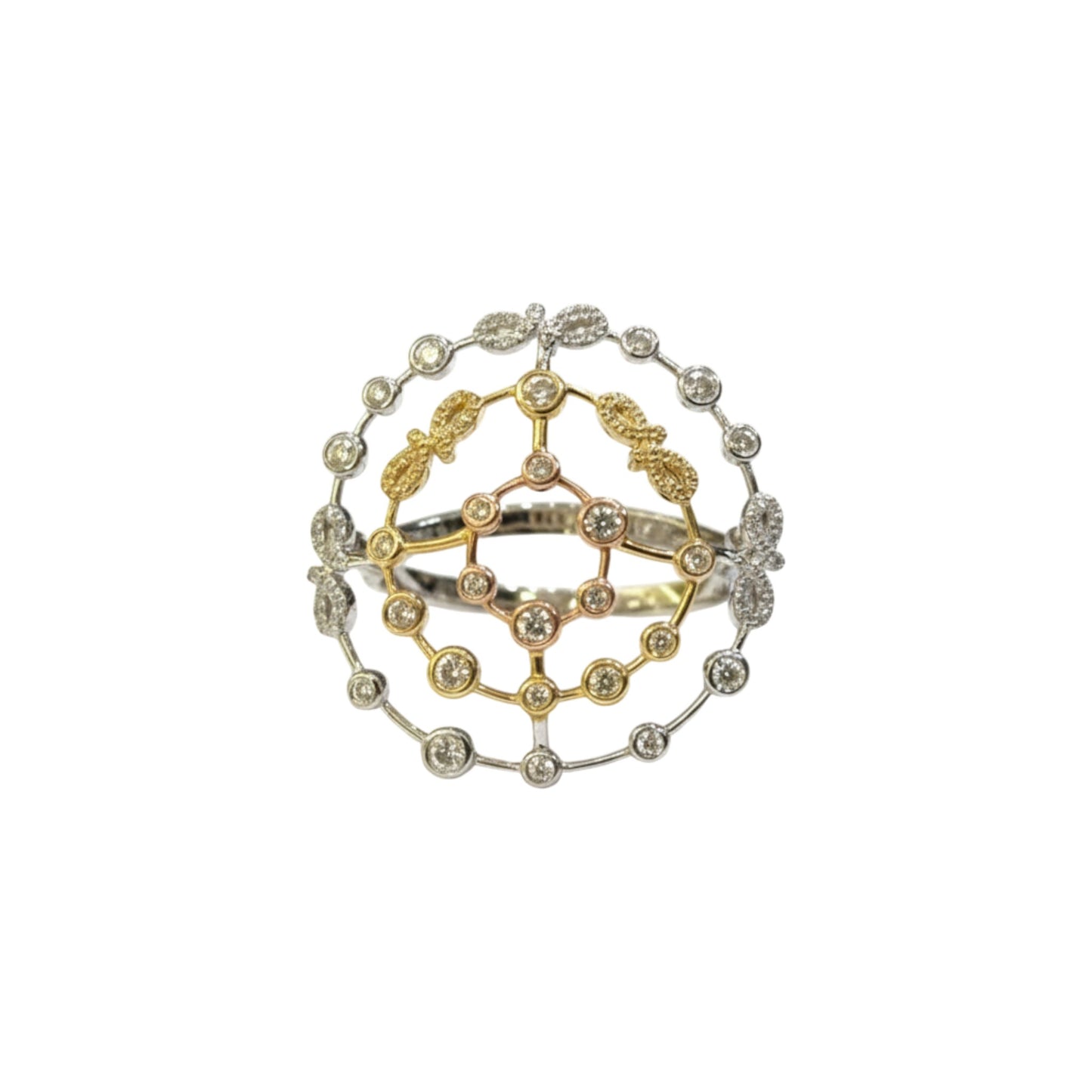 Set of three gold and silver rings with intricate designs on a white background