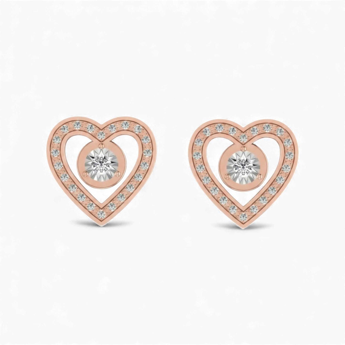 Rose gold heart-shaped earrings with clear gemstones on a white background