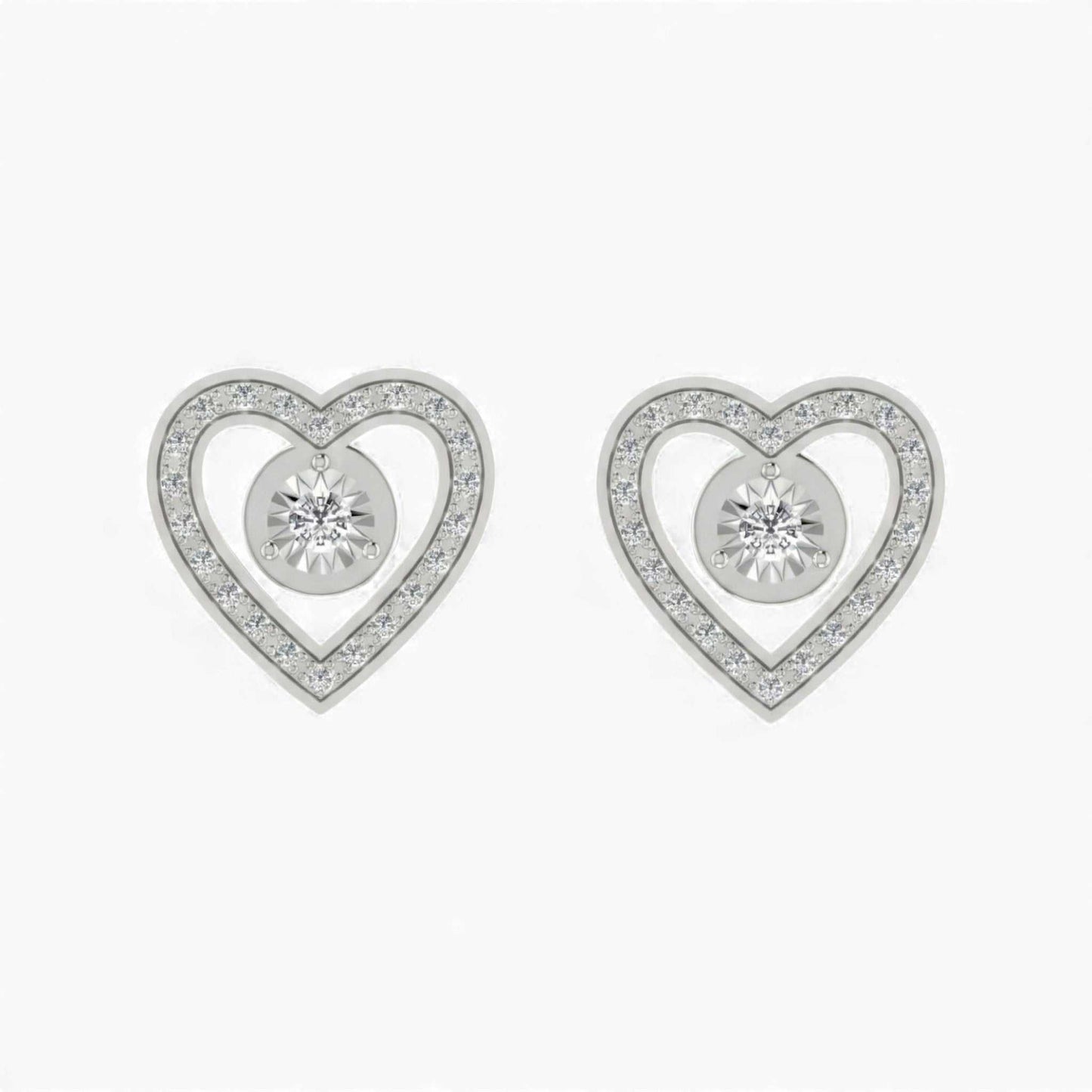Heart-shaped silver earrings with clear gemstones on a white background