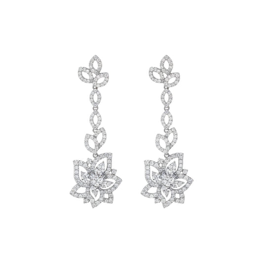 Pair of silver floral earrings on a white background