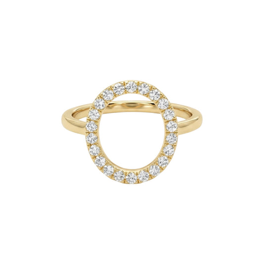 Gold ring with diamond accents on a white background