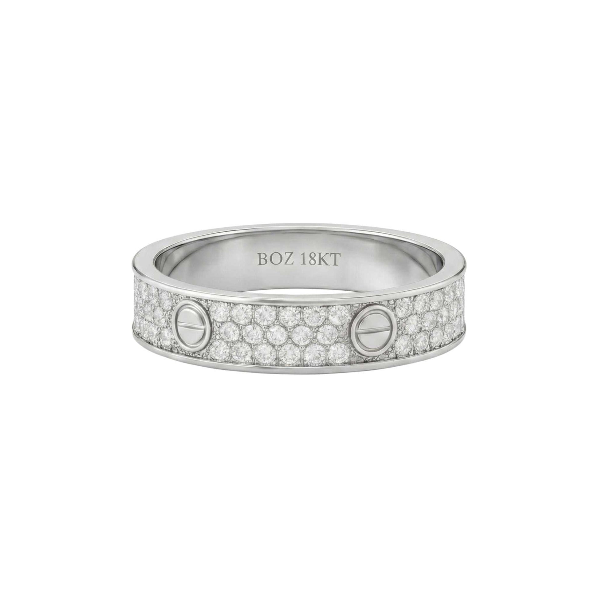 Silver ring with embedded diamonds on a white background