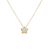 Gold necklace with a star-shaped diamond pendant on a white background