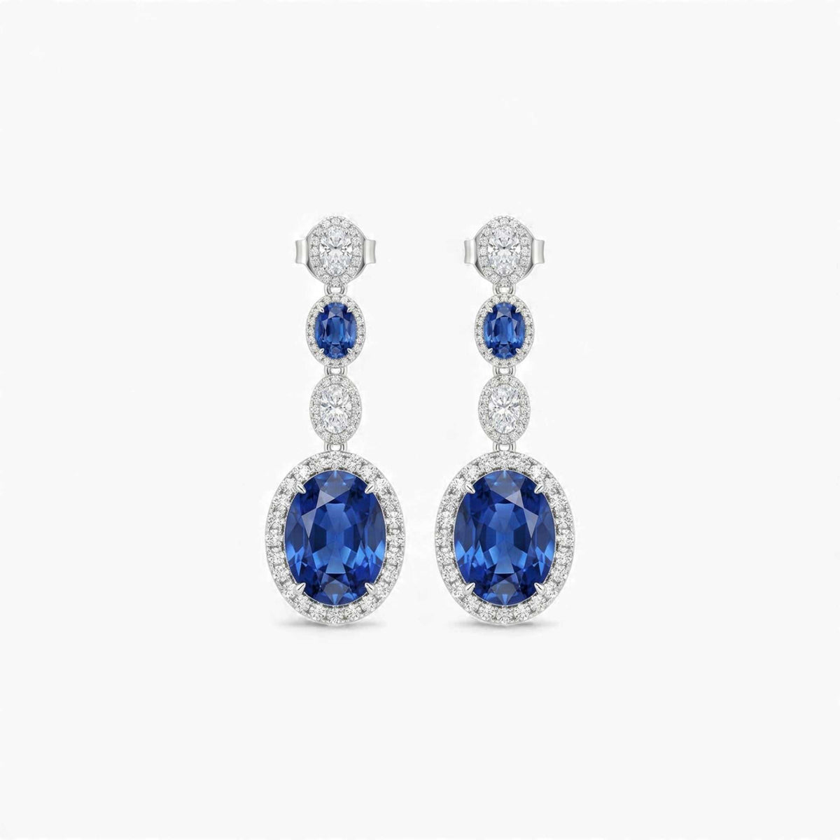 Meena Moissanite sterling silver drop earrings with blue colored gemstones and VVS1 D moissanite accents