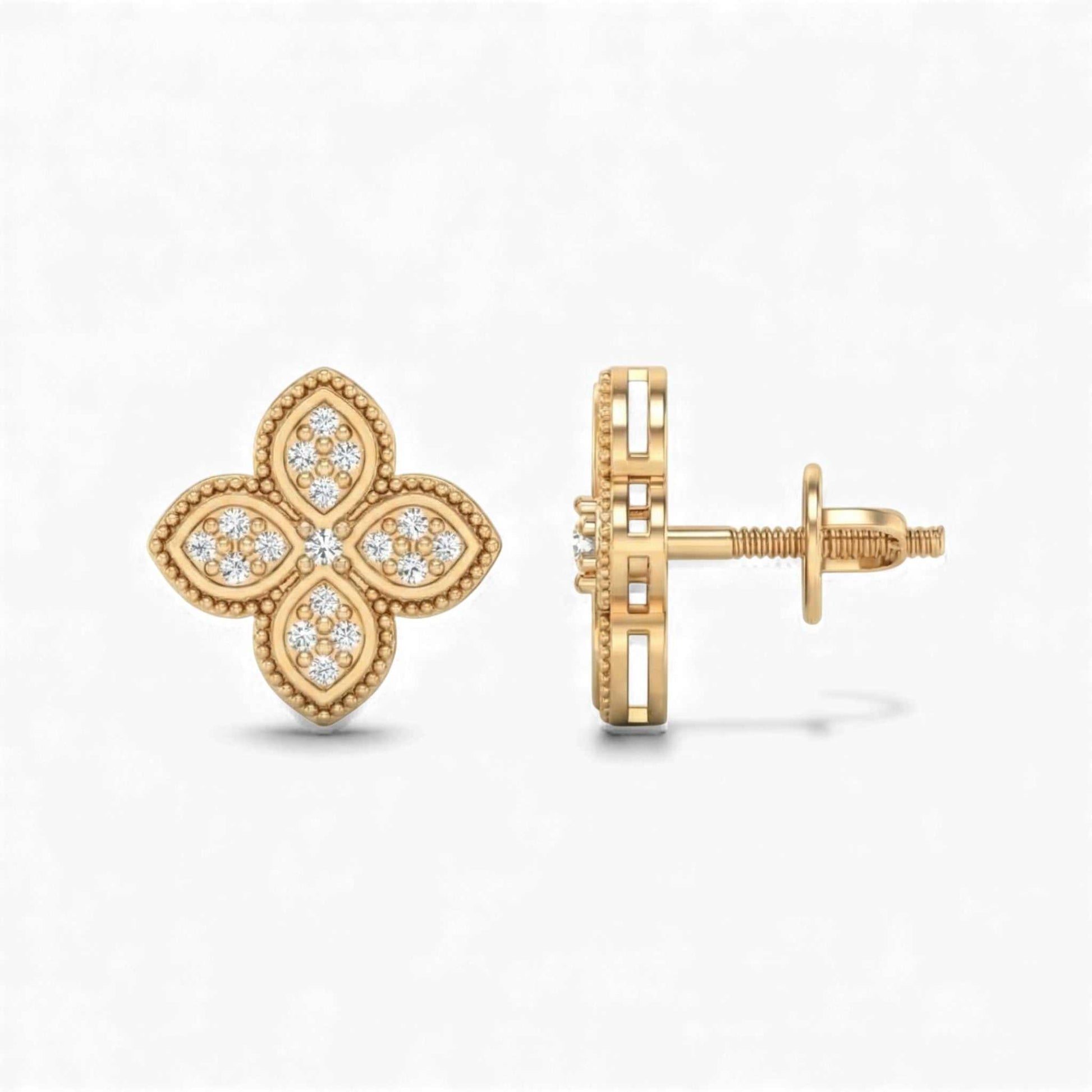 Gold earrings with diamond accents on a white background