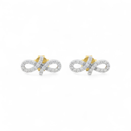 Pair of gold and silver infinity symbol earrings on a white background