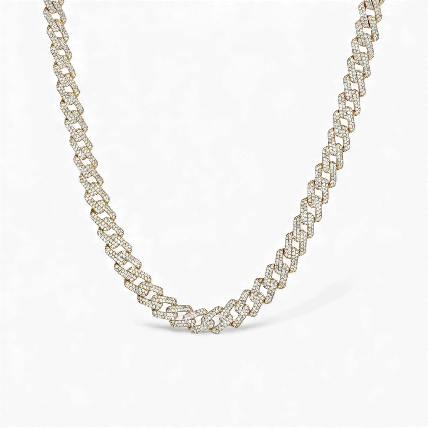 Gold chain necklace on a white background