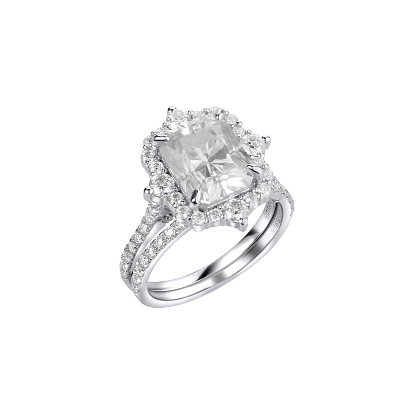 Silver ring with a large diamond and smaller diamonds on the band against a white background