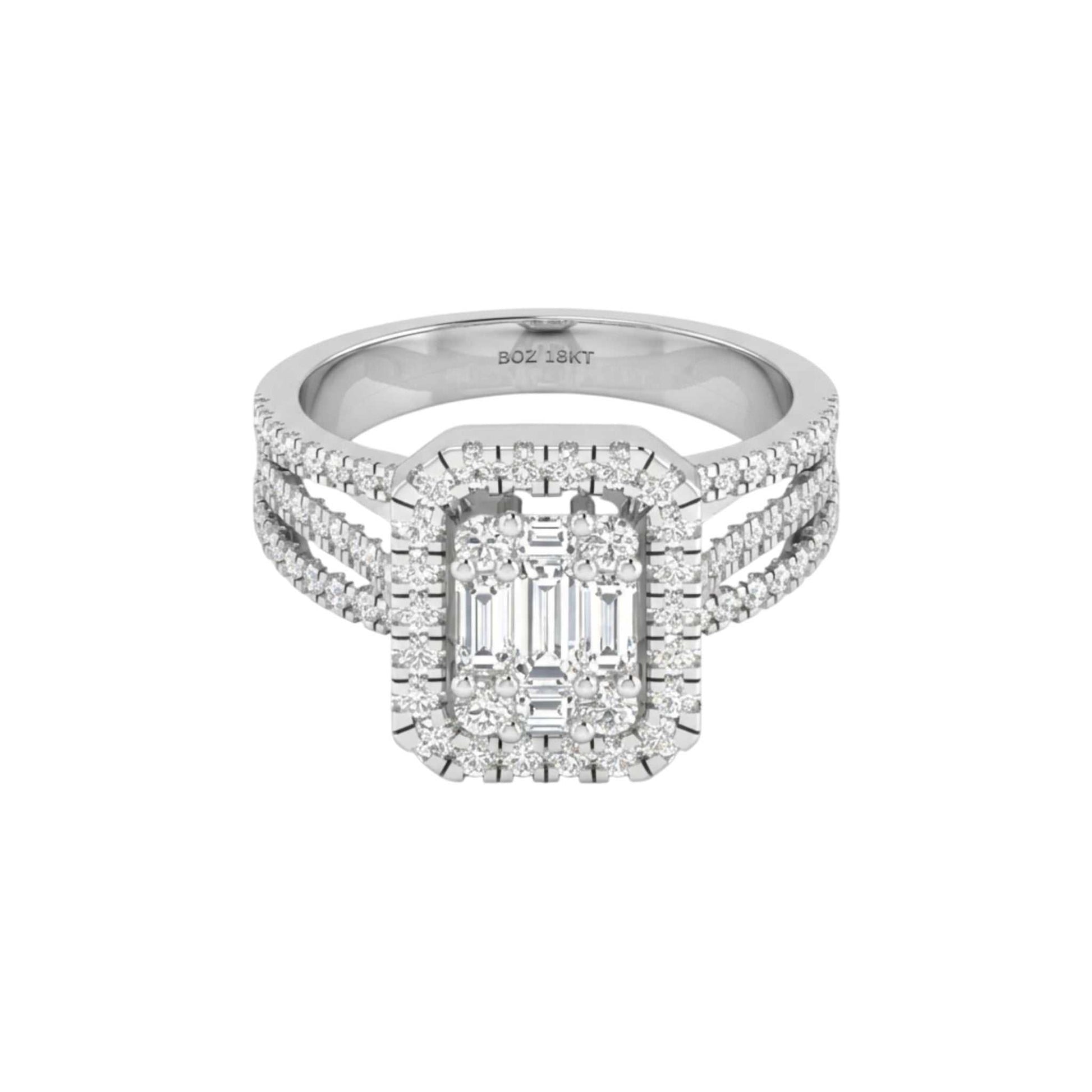 Diamond ring with emerald-cut center stone on a white background