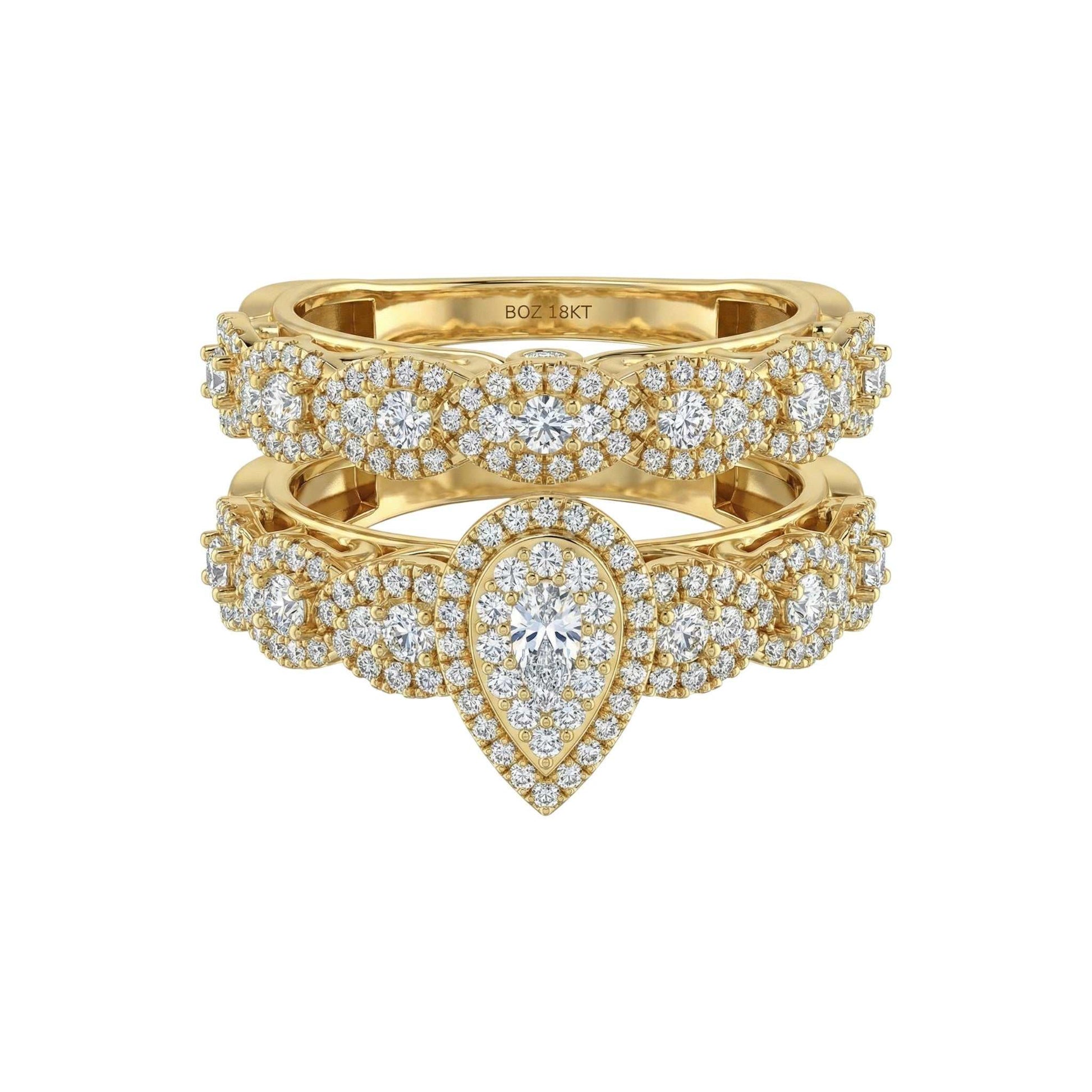 18KT gold bridal set with pear cut diamond cluster and matching diamond-studded band ring
