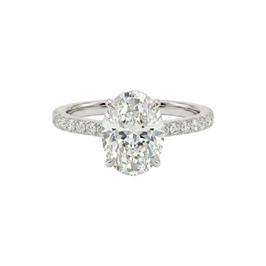 Diamond ring with a white gemstone on a white background