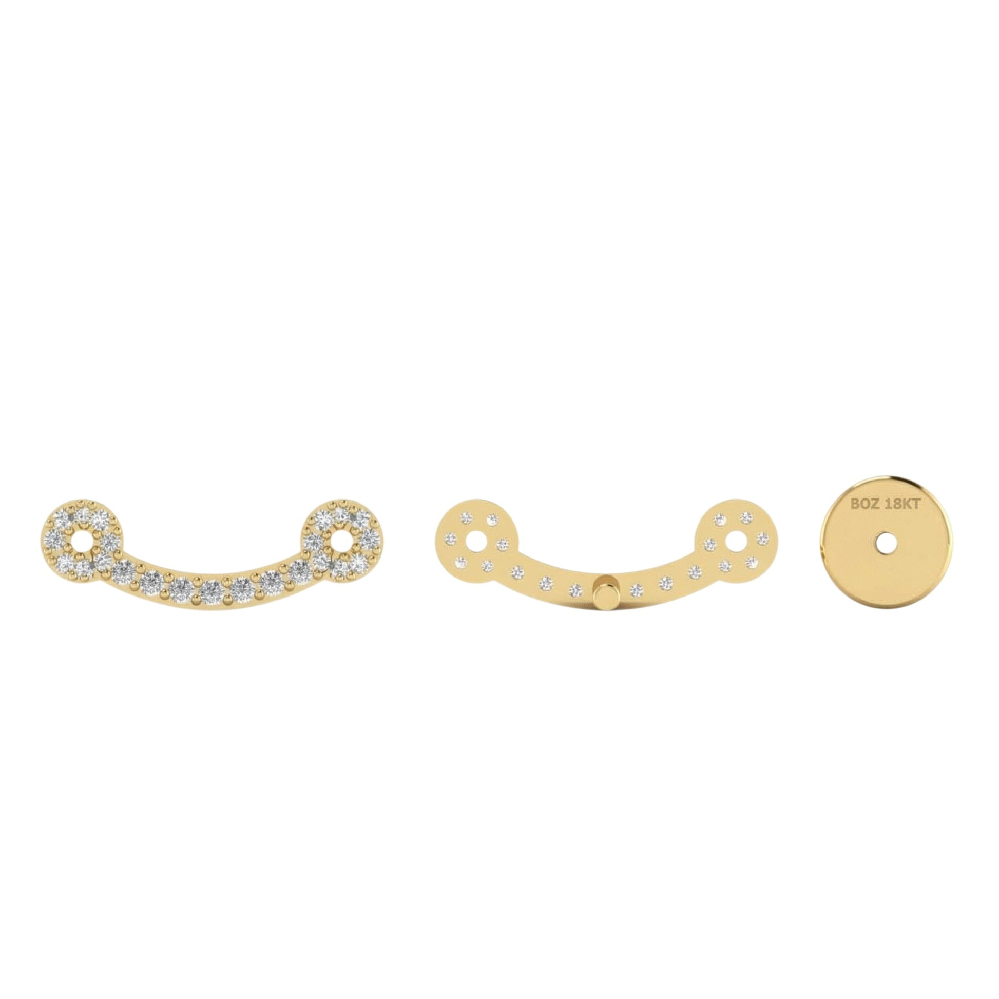 Gold jewelry pieces with gemstones on a white background