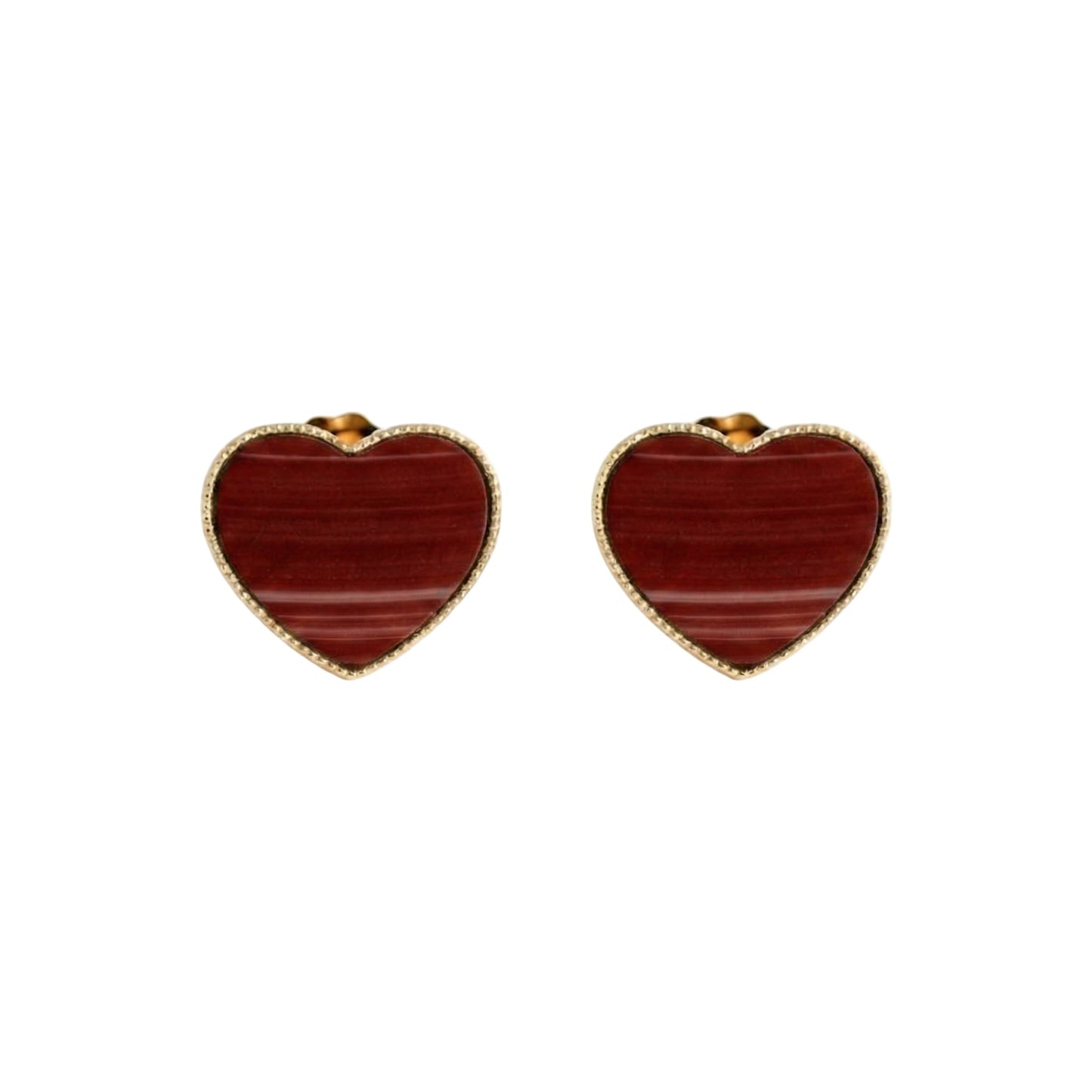 Heart-shaped earrings with red stone center on a white background