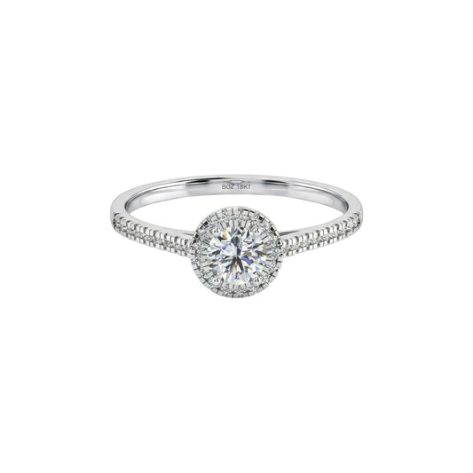 Thelma Round Cut Natural Diamond engagement ring in 18KT gold with pavé diamond halo and slim diamond-accented band