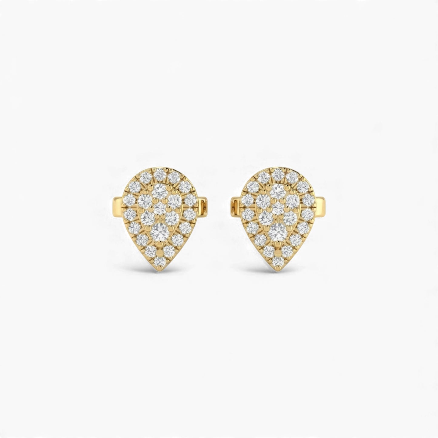 Heart-shaped gold earrings with diamond accents on a white background