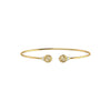 Gold bracelet with two decorative elements on a white background