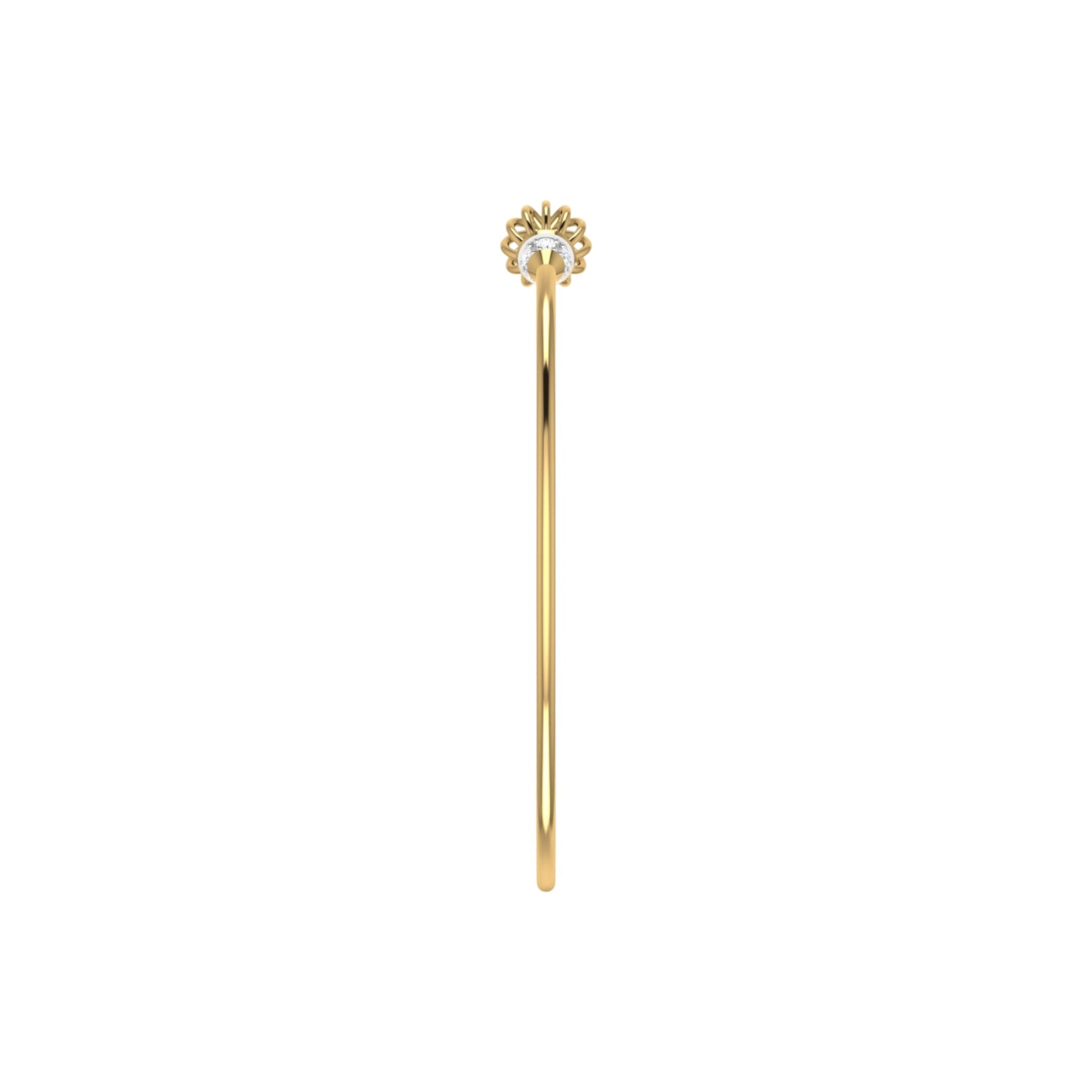 Gold hair stick with decorative top on a white background