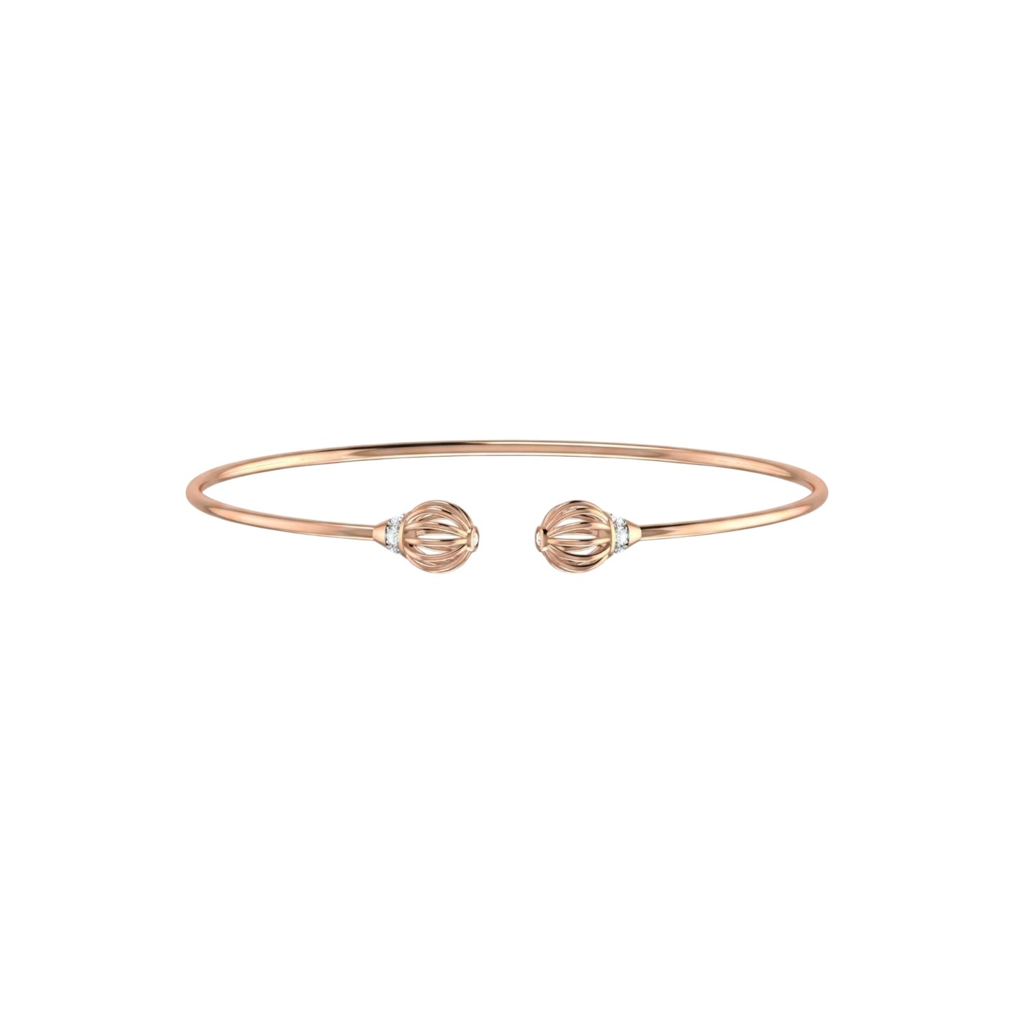 Rose gold bracelet with two spherical charms on a white background