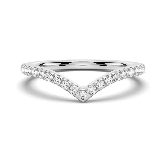 A curved 18K gold band with moissanite gemstones set in a V-shaped pattern on the top surface.