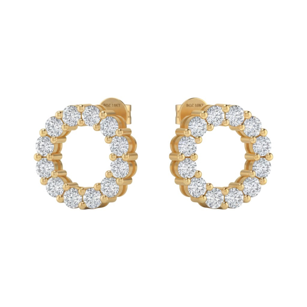 Gold hoop earrings with diamond accents on a white background
