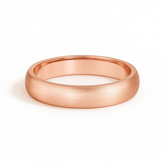 Rose gold ring on a white background