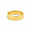 Gold ring on a white background