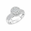 Silver ring with diamond accents on a white background