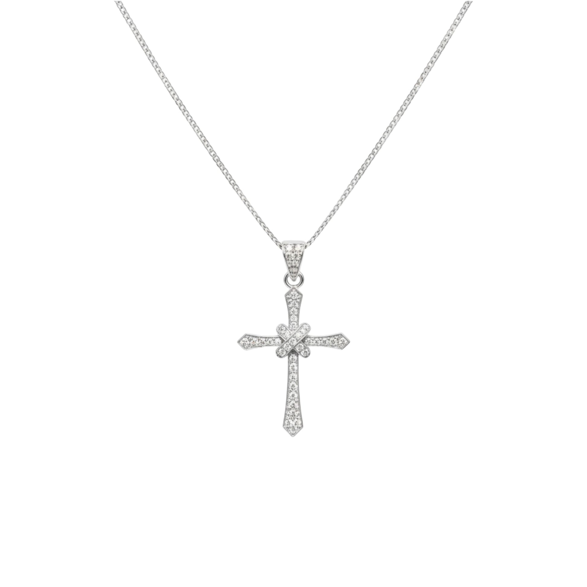 Silver cross pendant necklace on a white background