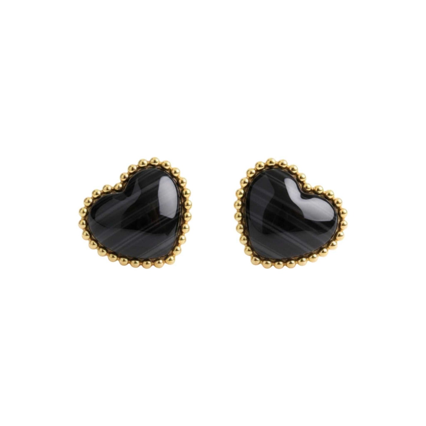 Heart-shaped black earrings with gold rims on a white background