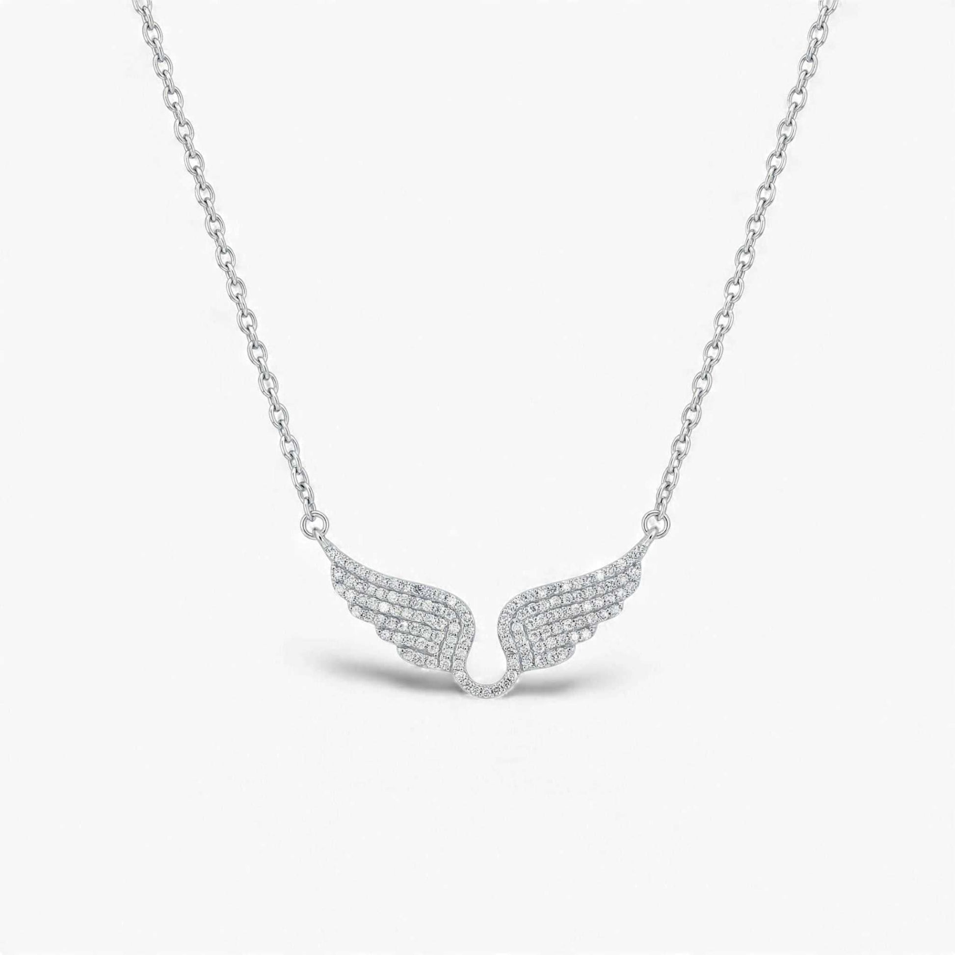 Angel Wings natural diamond pendant necklace in 18KT gold with sculpted wings and diamonds
