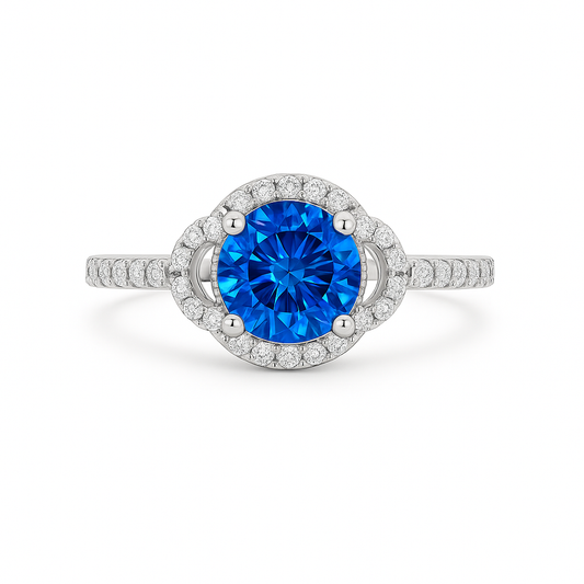Ring with a blue gemstone and diamond-studded band on a white background