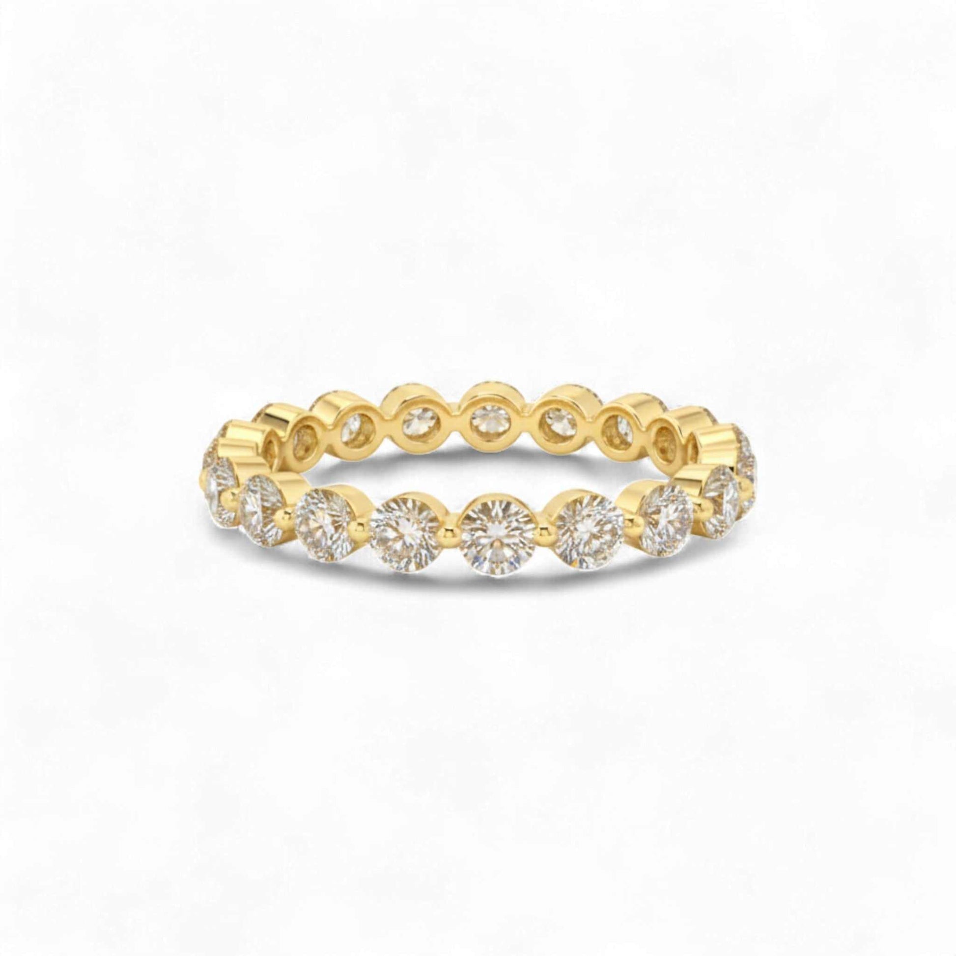 Gold ring with diamonds on a white background