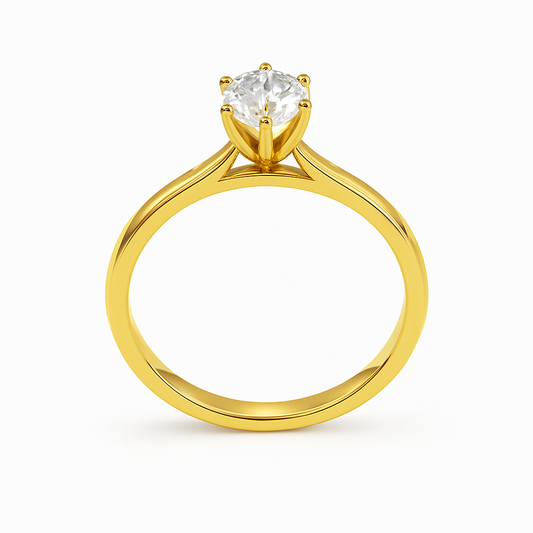 Gold ring with a diamond on a white background