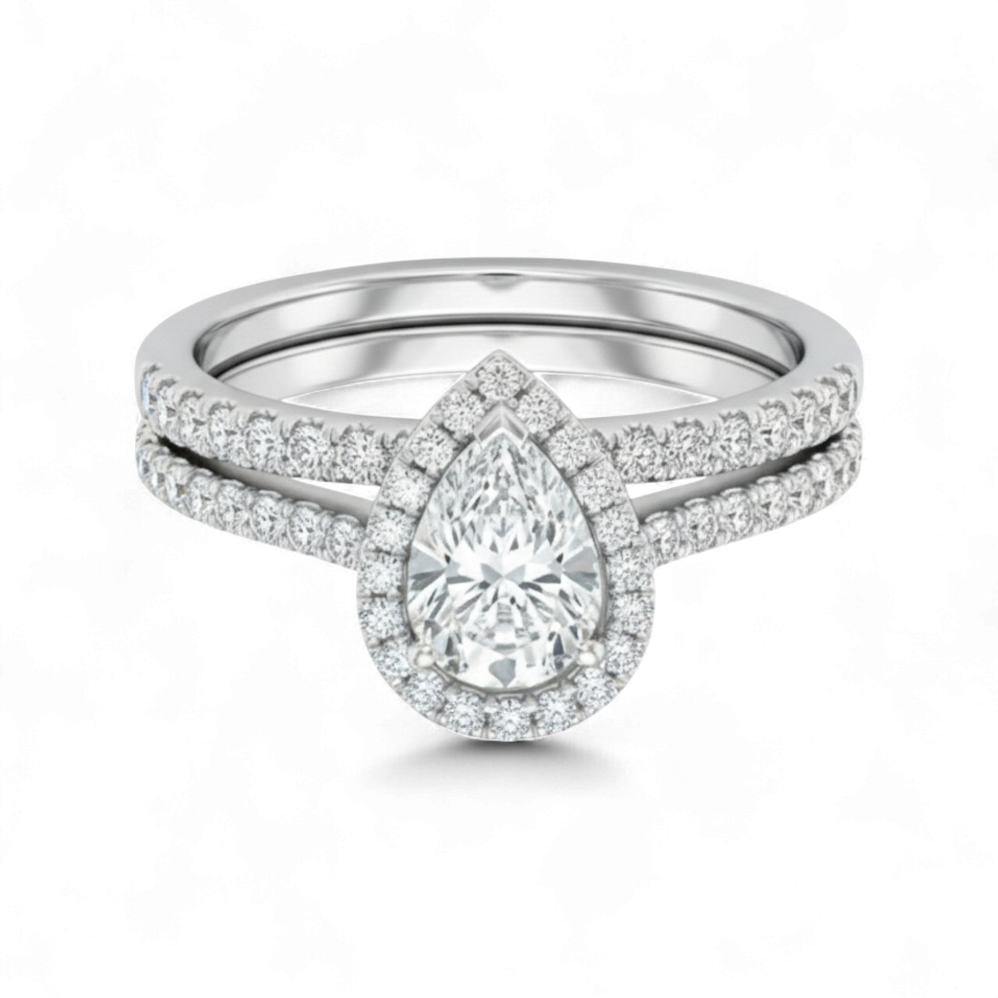 Diamond ring with pear-shaped center stone on a white background