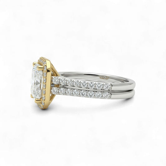 Gold and silver ring with diamond on a white background