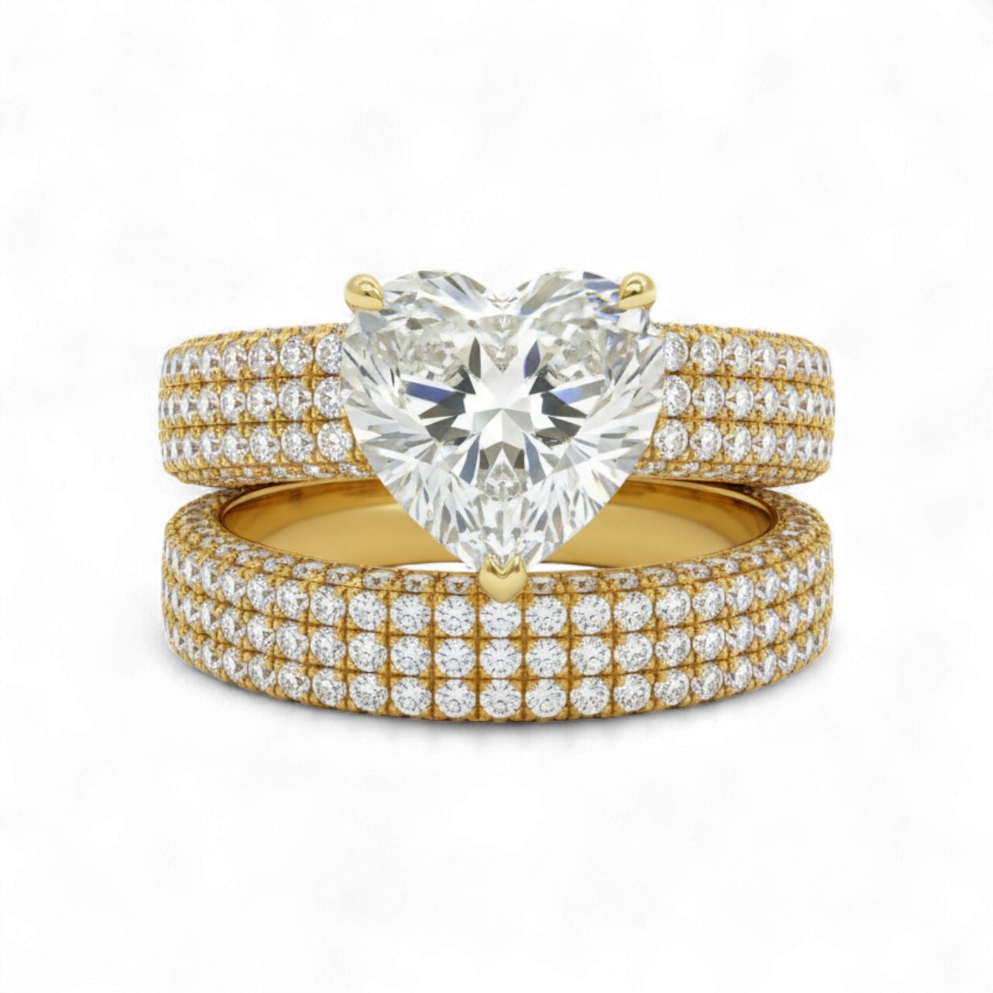Gold and diamond ring set on a white background
