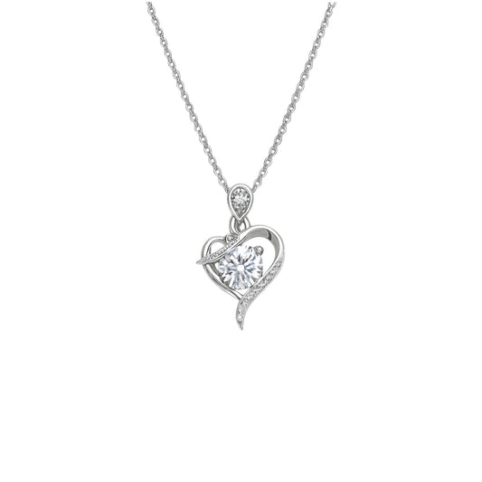 Silver heart-shaped pendant necklace on a white background