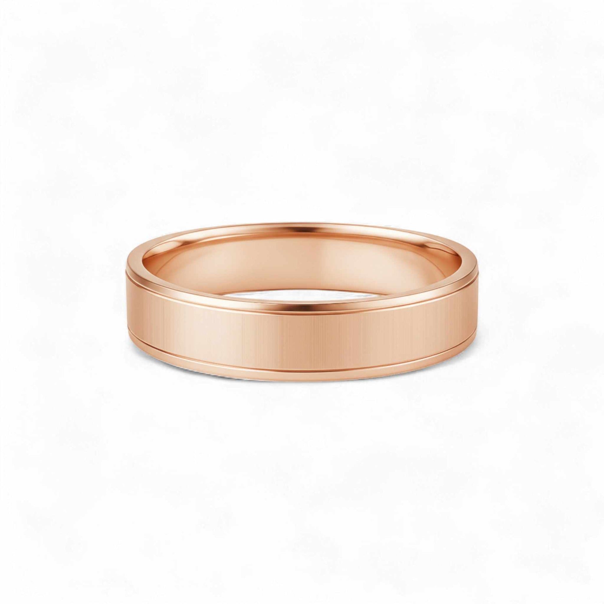 Rose gold ring on a white background
