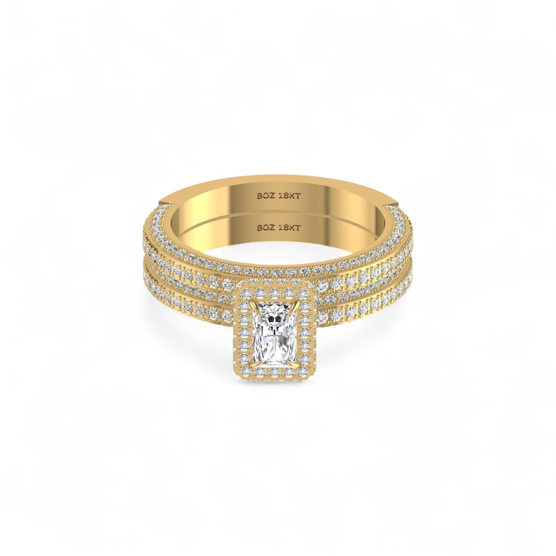 Gold ring with diamond accents on a white background