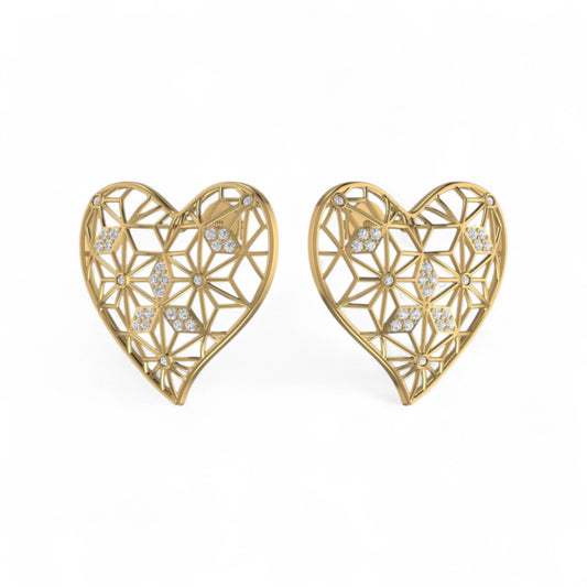 Gold heart-shaped earrings with diamond-like stones on a white background