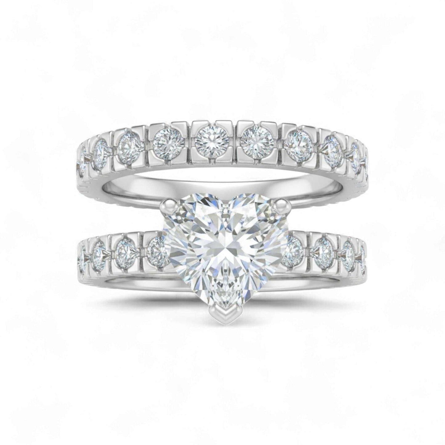 Heart shape cubic zirconia bridal set in 925 sterling silver with CZ accents on bands