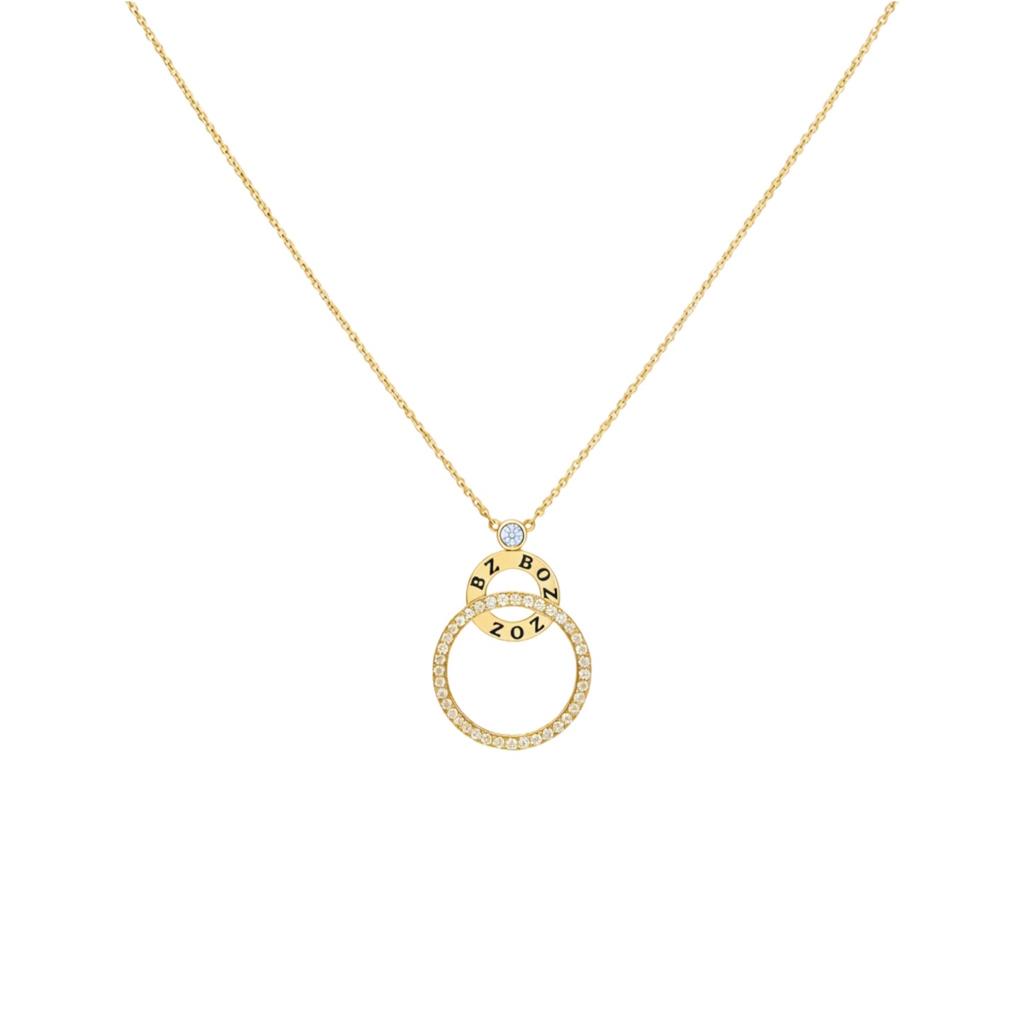 Gold necklace with a circular pendant on a white background